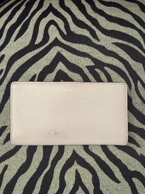 kate spade pale pink pebbled leather continental wallet with gold logo
